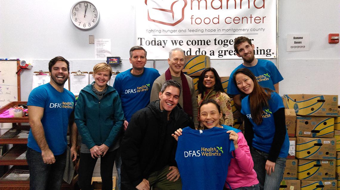 NIH volunteers pose at Manna Food Center.