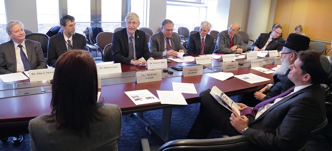 NIH leaders and the Israeli leaders seated around board room table