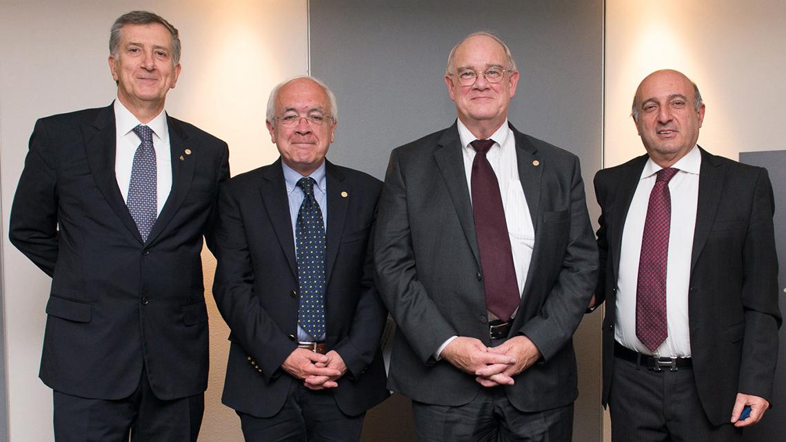 Dr. Paul Sieving stands with Italian colleagues.