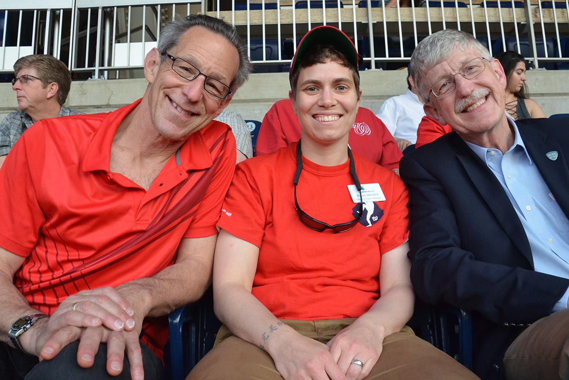 Dr. Collins in the stands with friends.