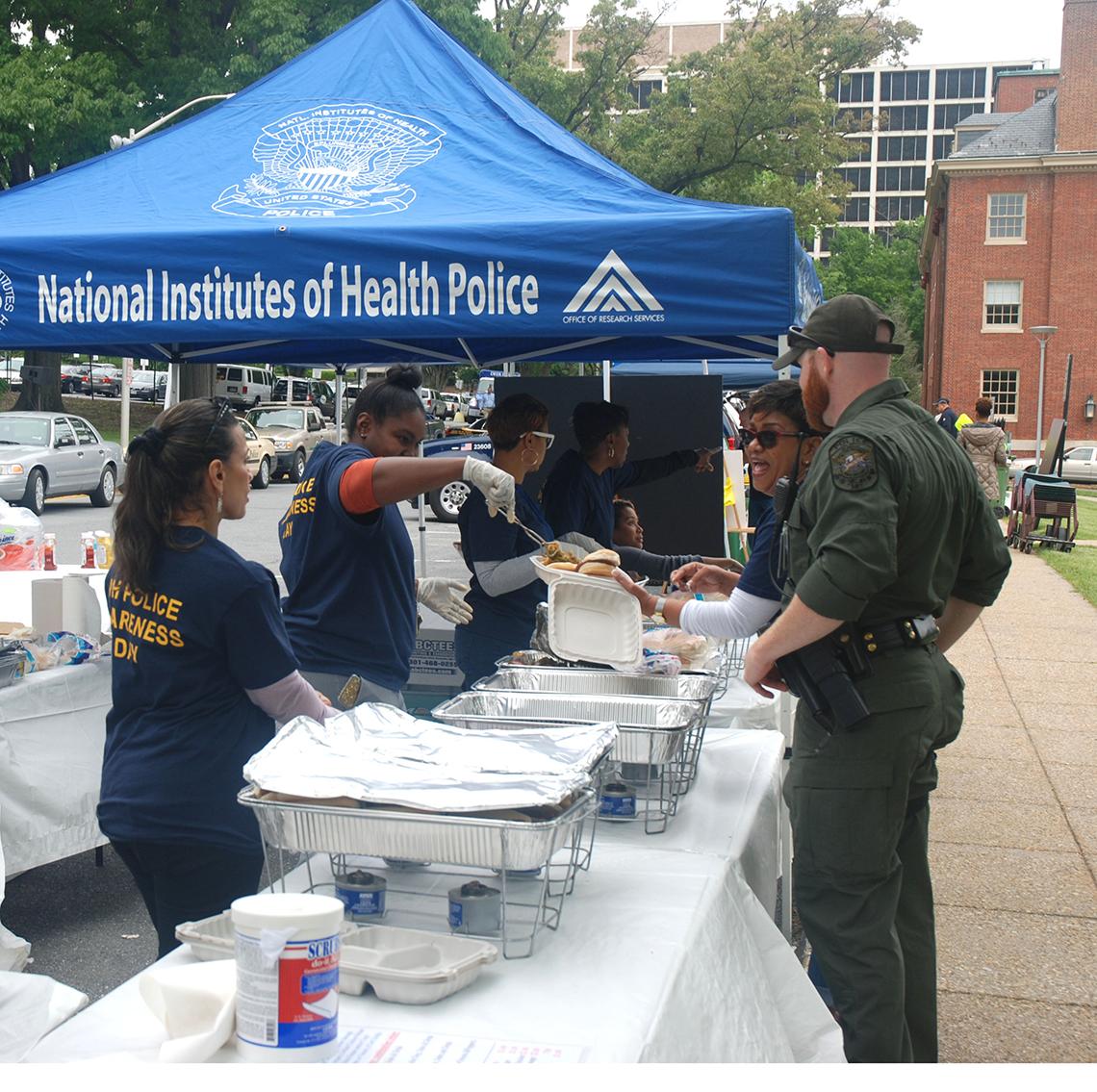 Volunteers serve lunch