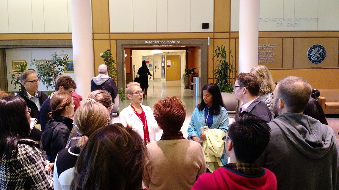 Steakley speaks to fellows in the CC atrium