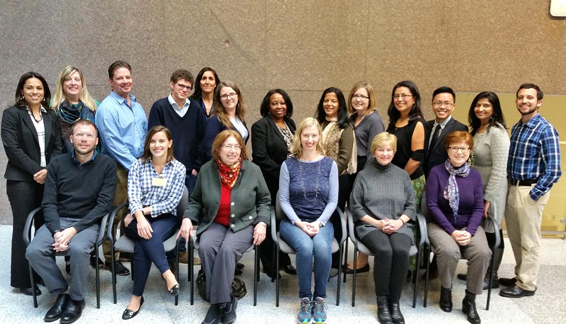 Fellows pose with staff