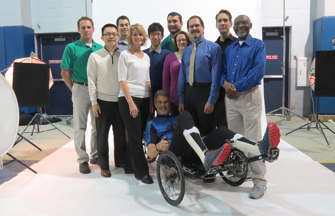 Cybathlon pilot McClellan is surrounded by members of Team Cleveland