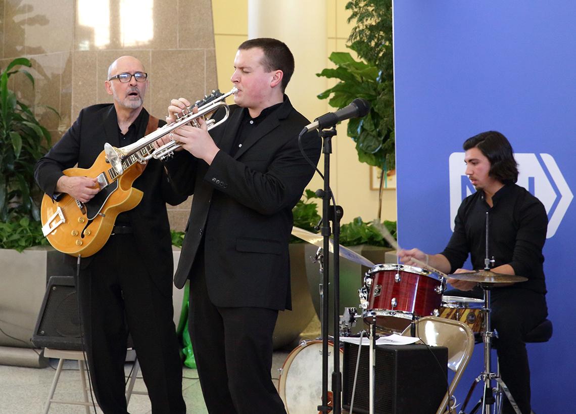 Three University of Maryland Jazz Quintet members-guitar, trumpet and drums