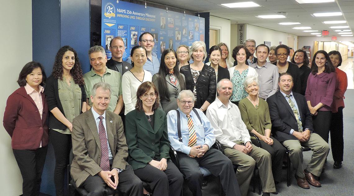 large group of people facing camera for posed photo