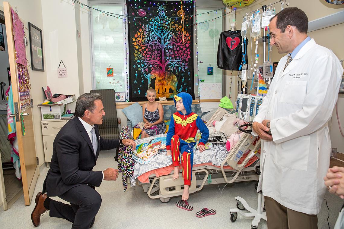 Mr. Bardis meets young patient at NIH.