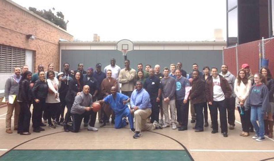 NIH'ers pose on basketball court