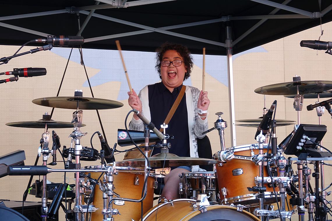 Ness plays the drums