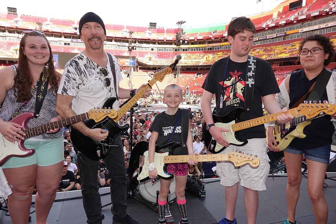 CC patients play guitar with The Edge