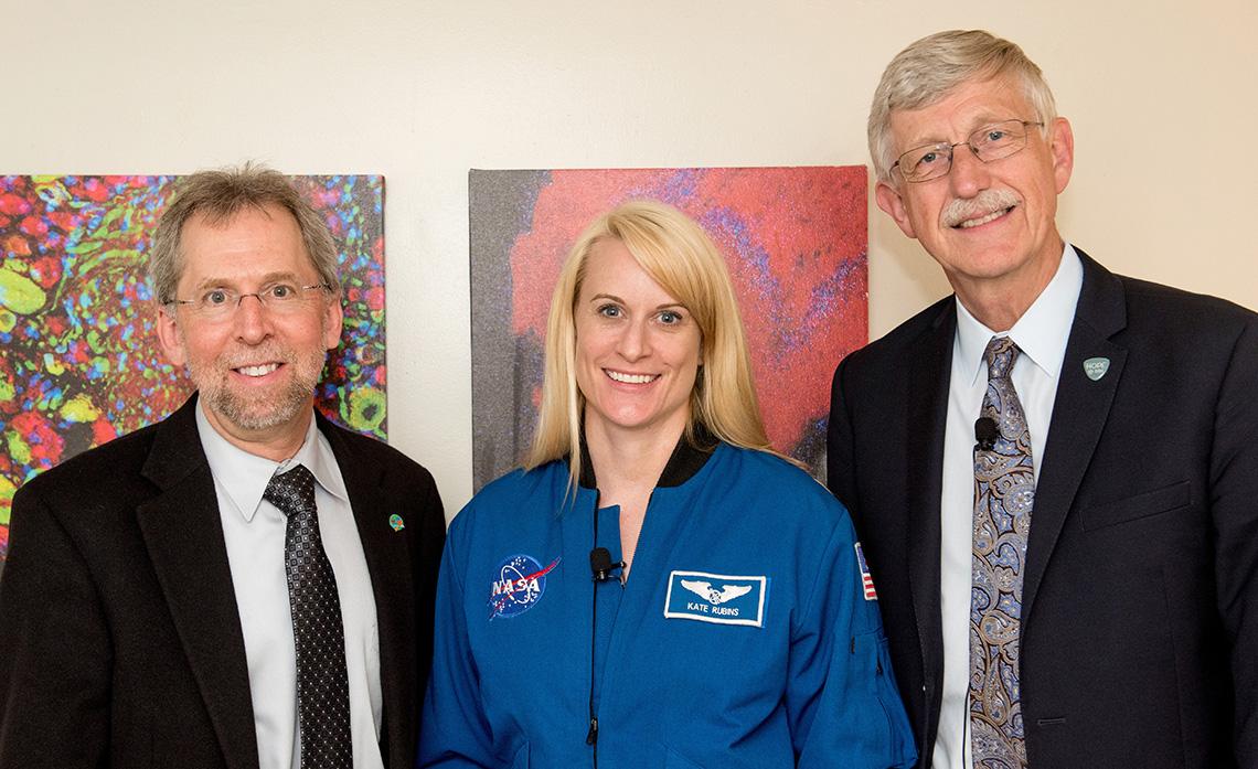 NHGRI director Dr. Eric Green with astronaut Dr. Kate Rubins and Dr. Collins