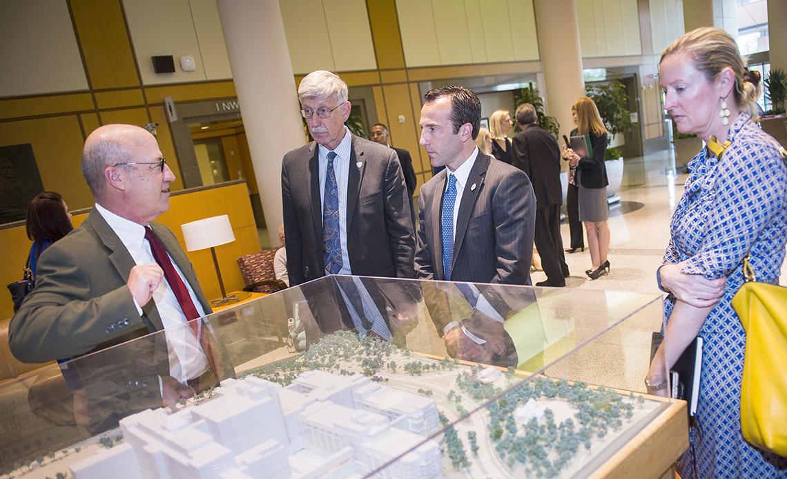 Mr. Cordish and Ms. Lapinski view model of Clinical Center.