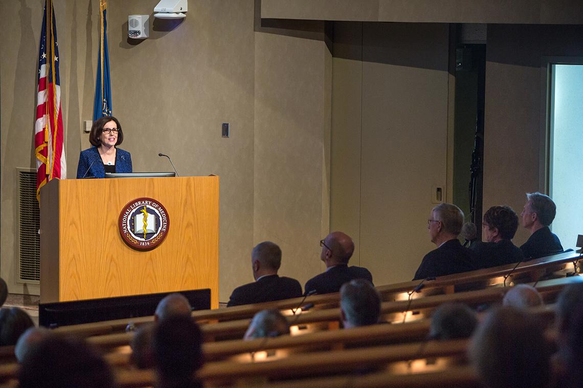 Dr. Córdova speaks in front of an audience