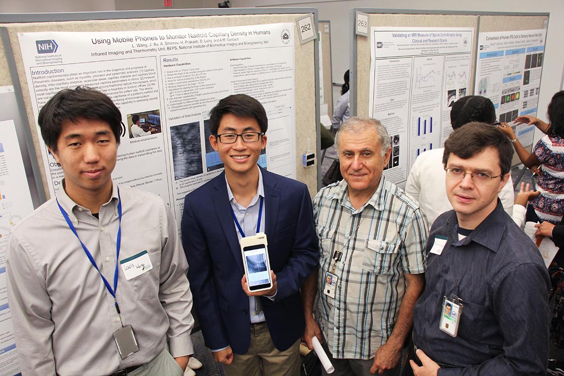 People at scientific poster