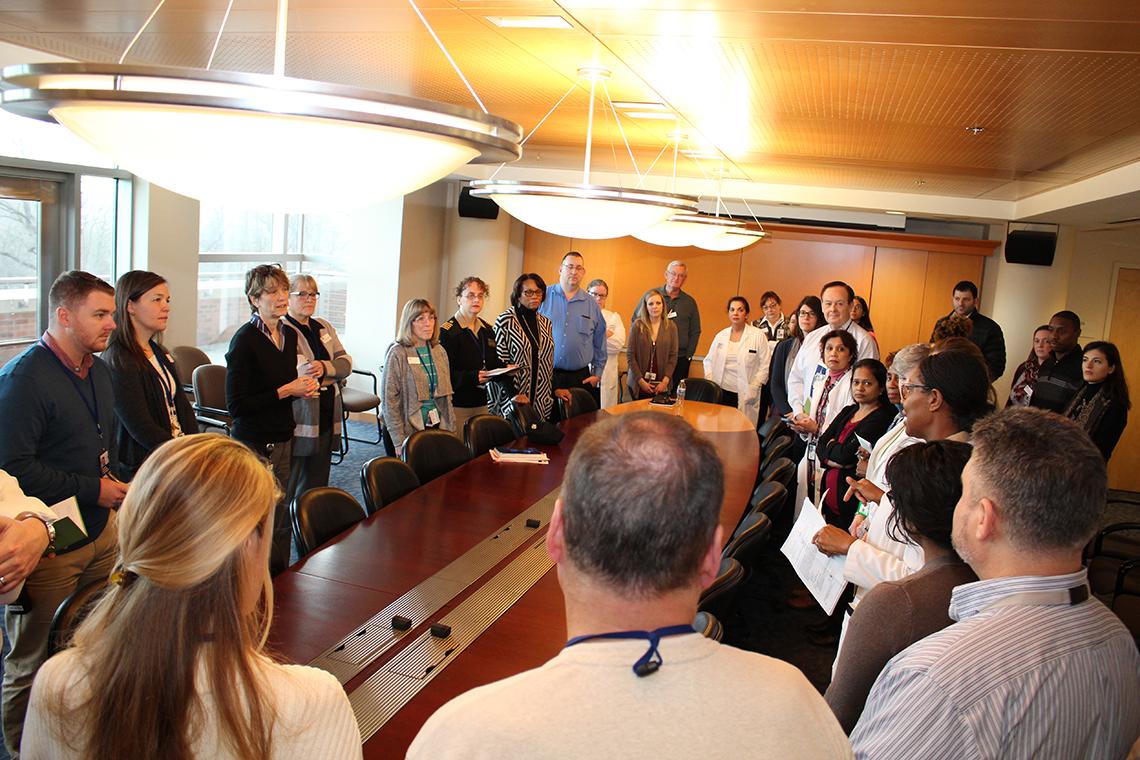 Staff from CC departments and NIH institutes meet in the medical board room