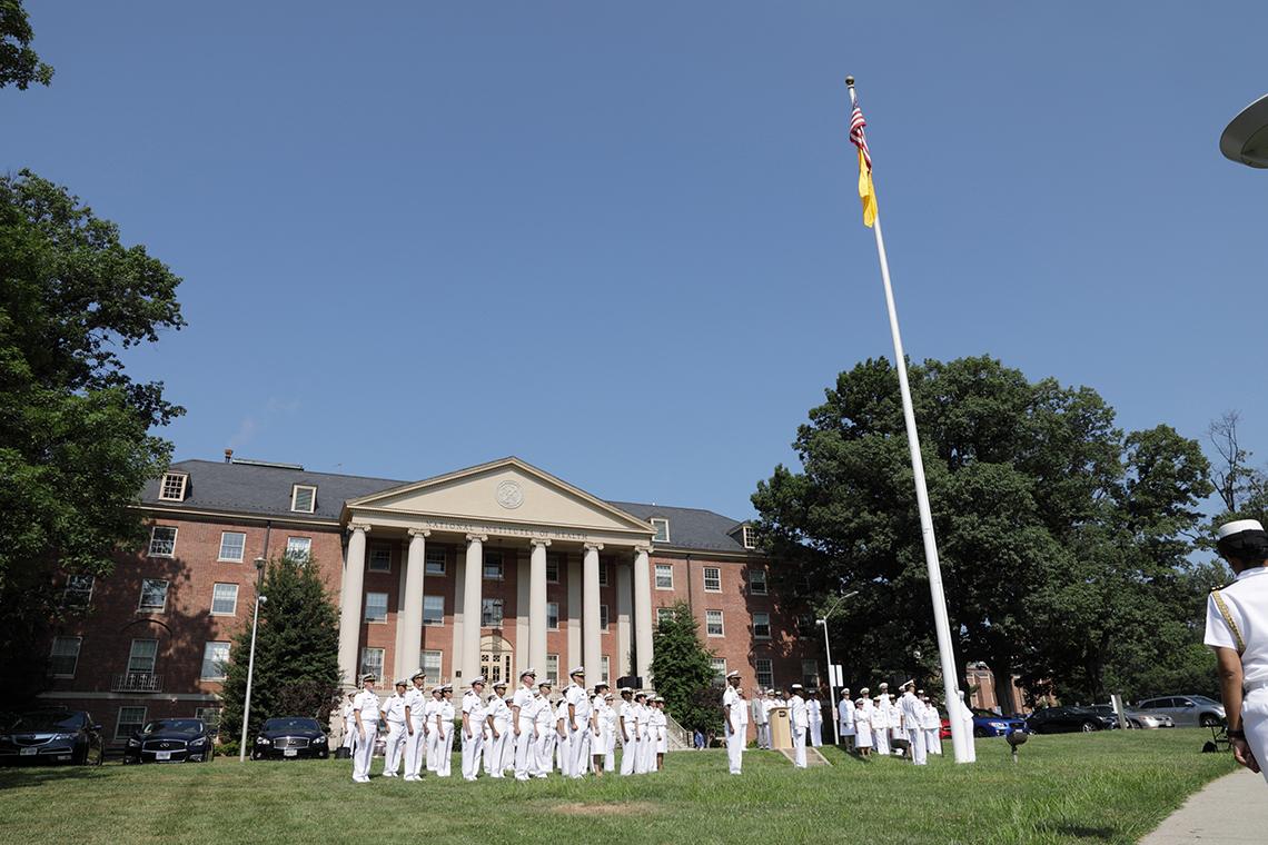 The Public Health Service flag is raised.
