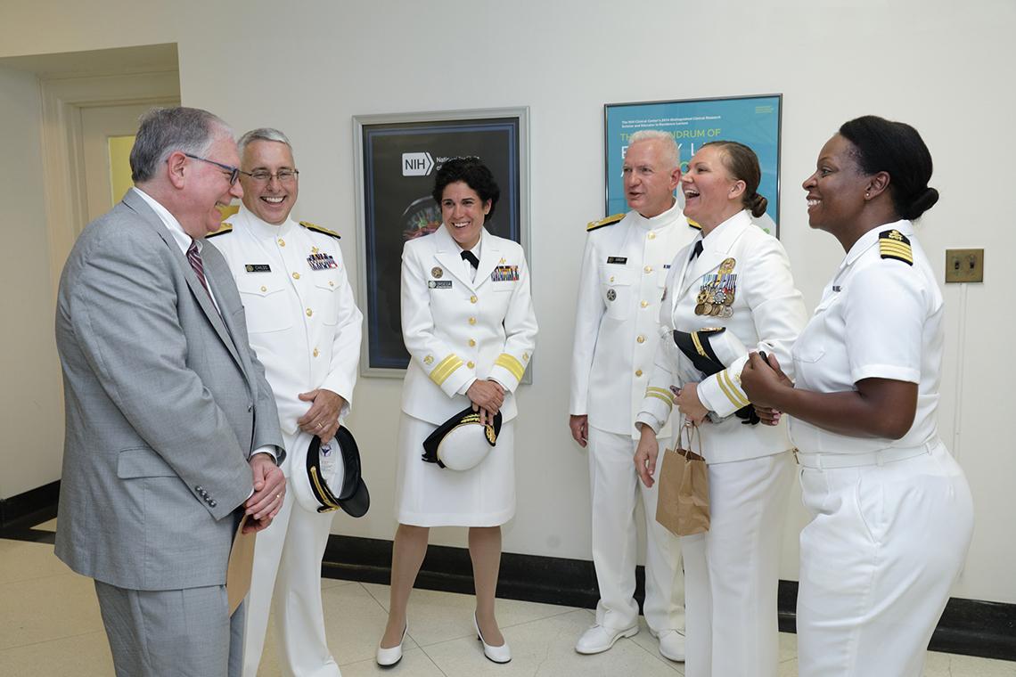 Tabak, Radm. Rick Childs, Orsega, Giroir, Lt. Elizabeth Cohen, and Capt. Tiffany Edmonds