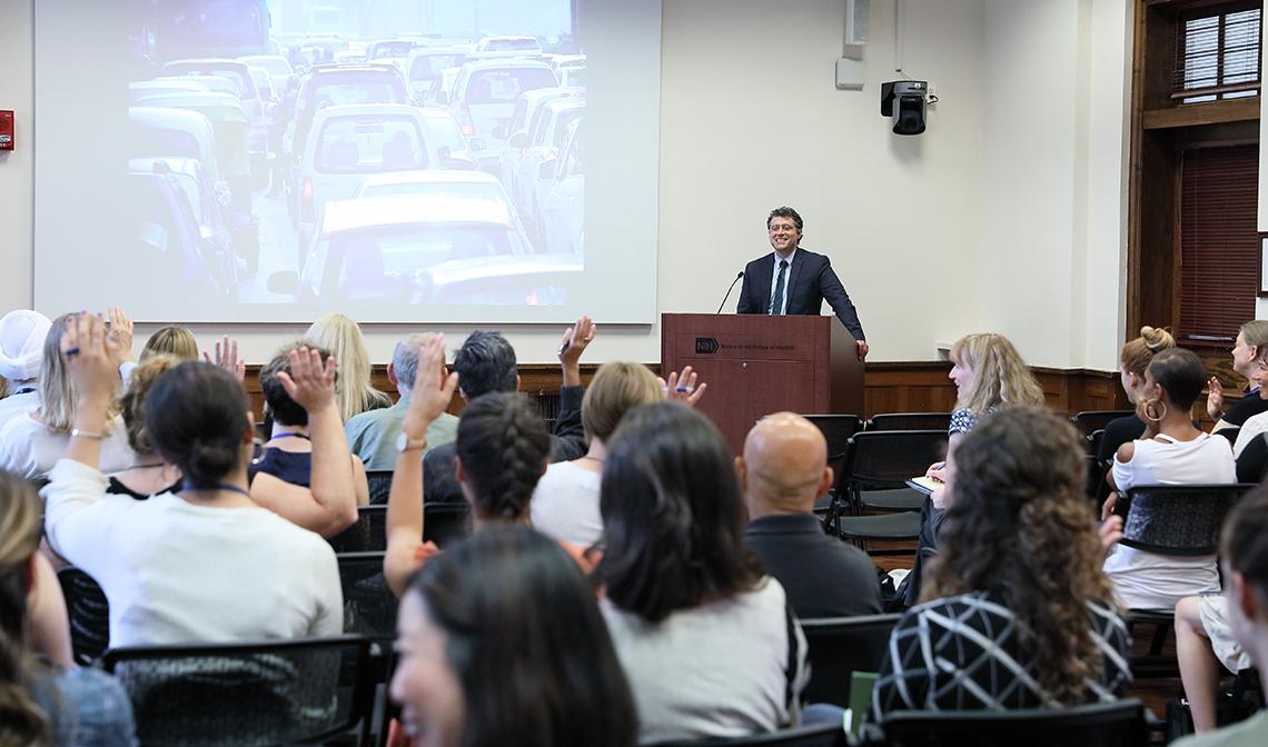 Dr. Bratman speaks to a crowd