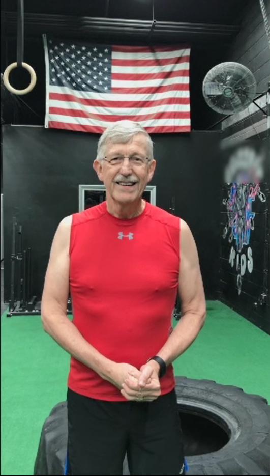 Dr. Collins in the gym with monster tire