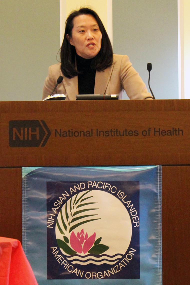 Keynote speaker Dr. Janice Lee at podium