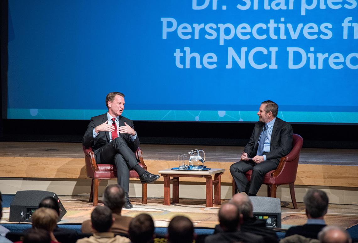 Sharpless sits and chats with Dr. Lowy on stage