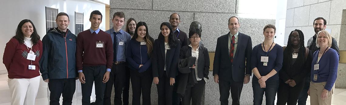 group photo of students with NIH staffers