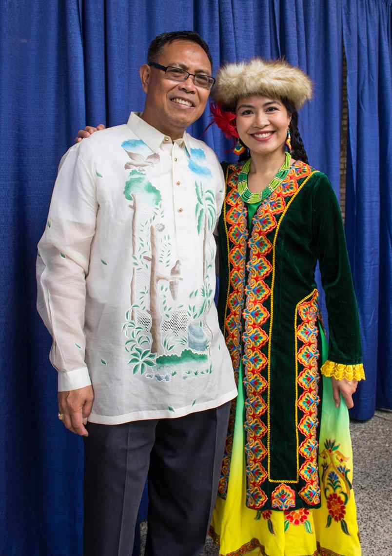Edgar Esmaba rocks the Filipino barong with Karen David in Uighur traditional dress and hat.