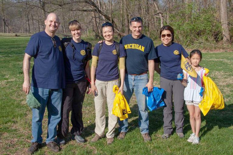 Group shot of those helping to clean up a park.