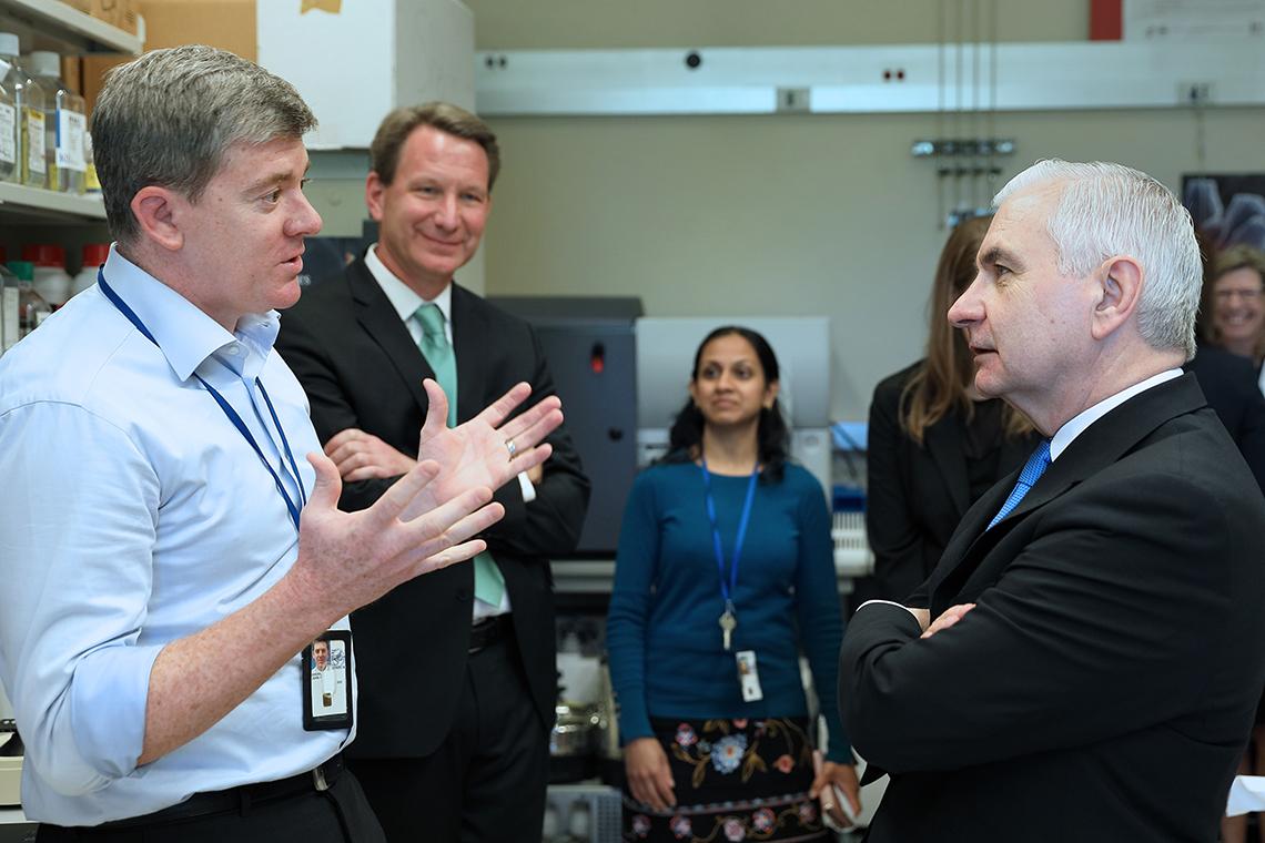 Dr. Jack Shern talking to Sen Reed.
