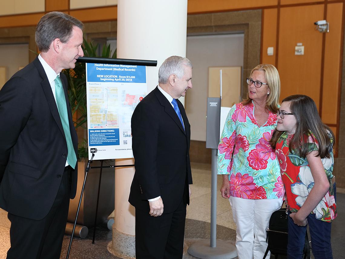 Sharpless and Reed greet patient Lilly Ann Brooks and her mother Candee Brooks.