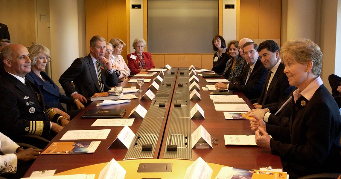 McGowan briefs surgeon general Dr. Richard Carmona, the Duchess of Cornwall and Prince Charles.
