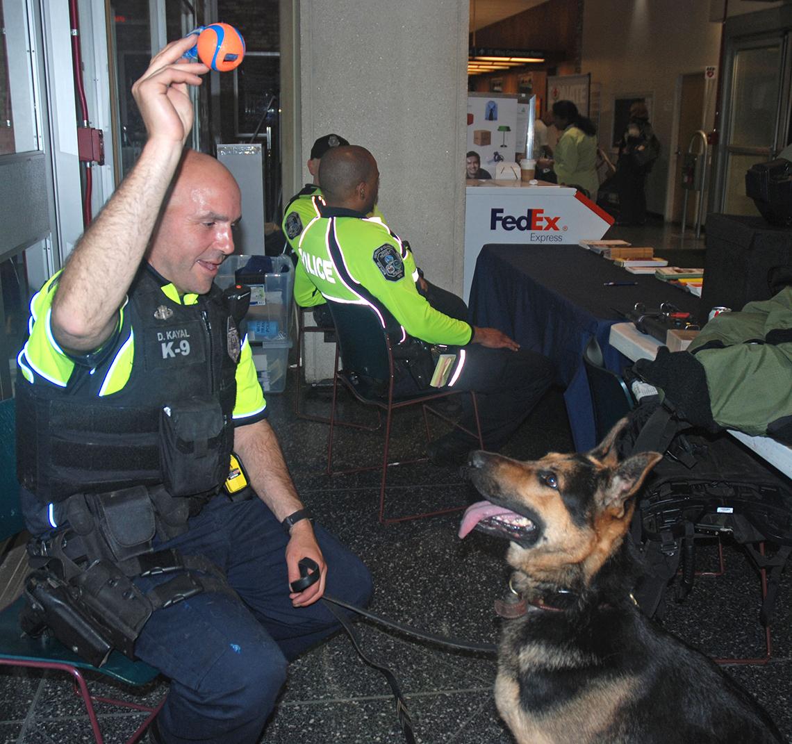 Washington, D.C. Metro Transit Police officer D. Kayal with bomb-sniffing dog Hugo.