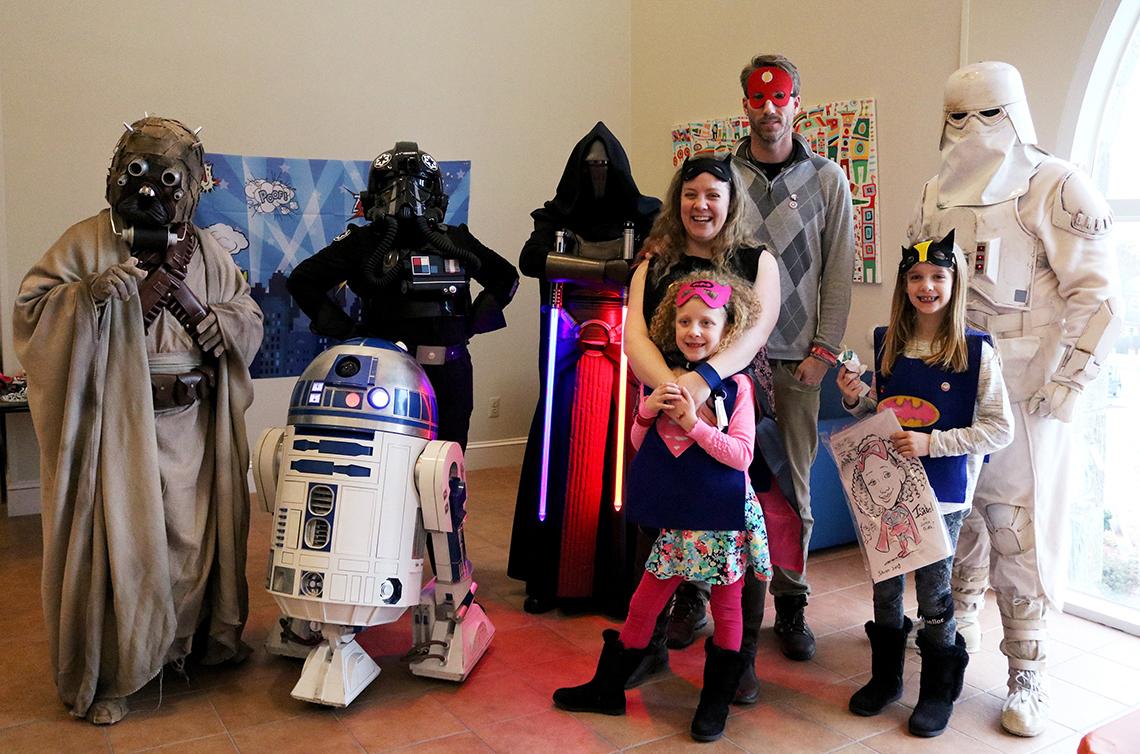 Members of the 501st Legion with Isabel and Lina Kerr and their parents Tara and Gordon.