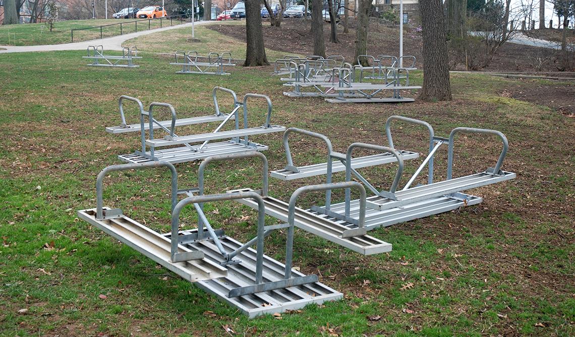 Picnic tables neatly placed upside down.