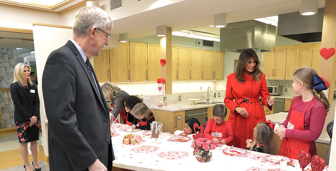 Melania Trump chats with Caitlyn Ribas, with Jennie Lucca and Dr. Francis Collins looking on.