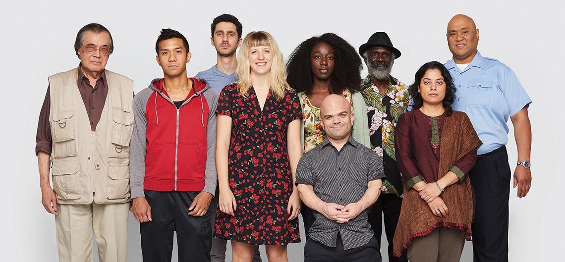 A diverse group of people standing together.