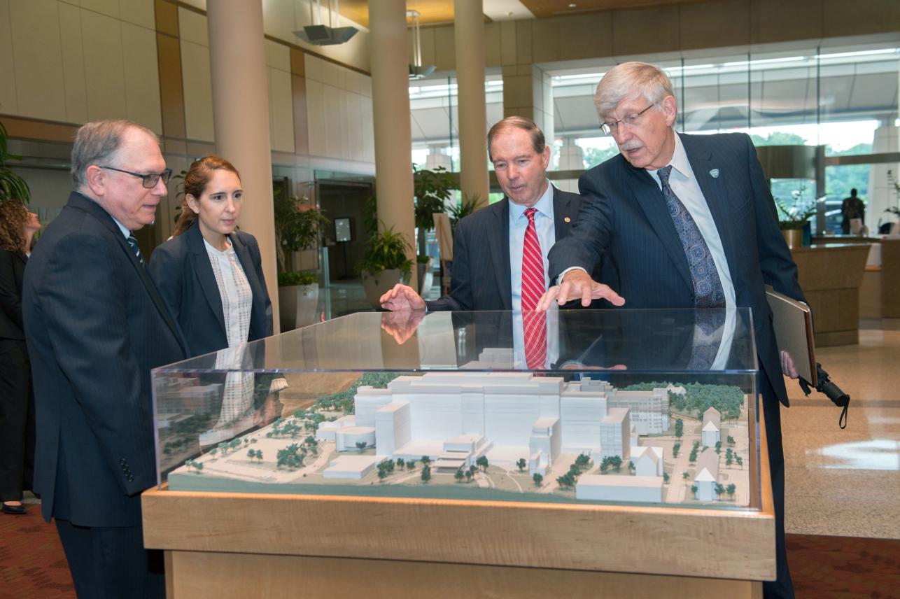 Udall and Arias-Jones get oriented to the Clinical Center by Tabak and Collins.