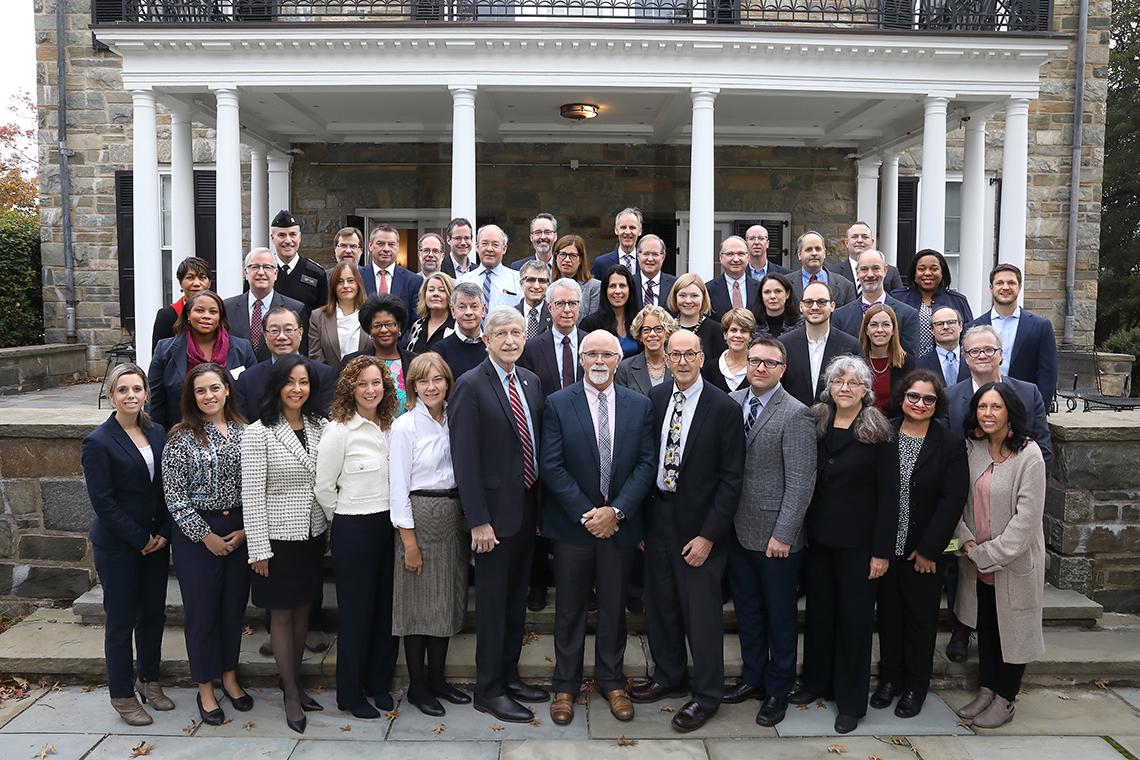 Group photo of NIH and CIHR members.