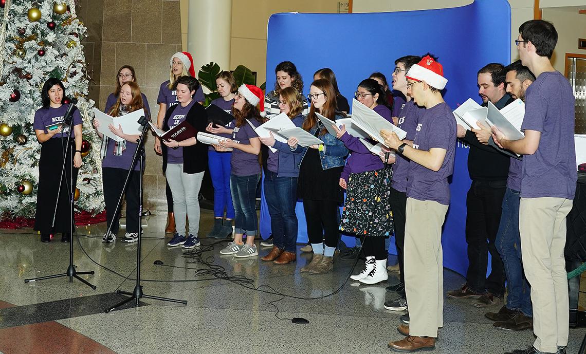 Singers perform for the holidays at the Clinical Center.