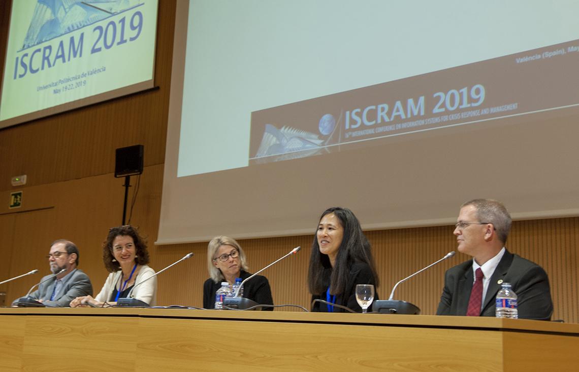 Peterson sits on a panel with others