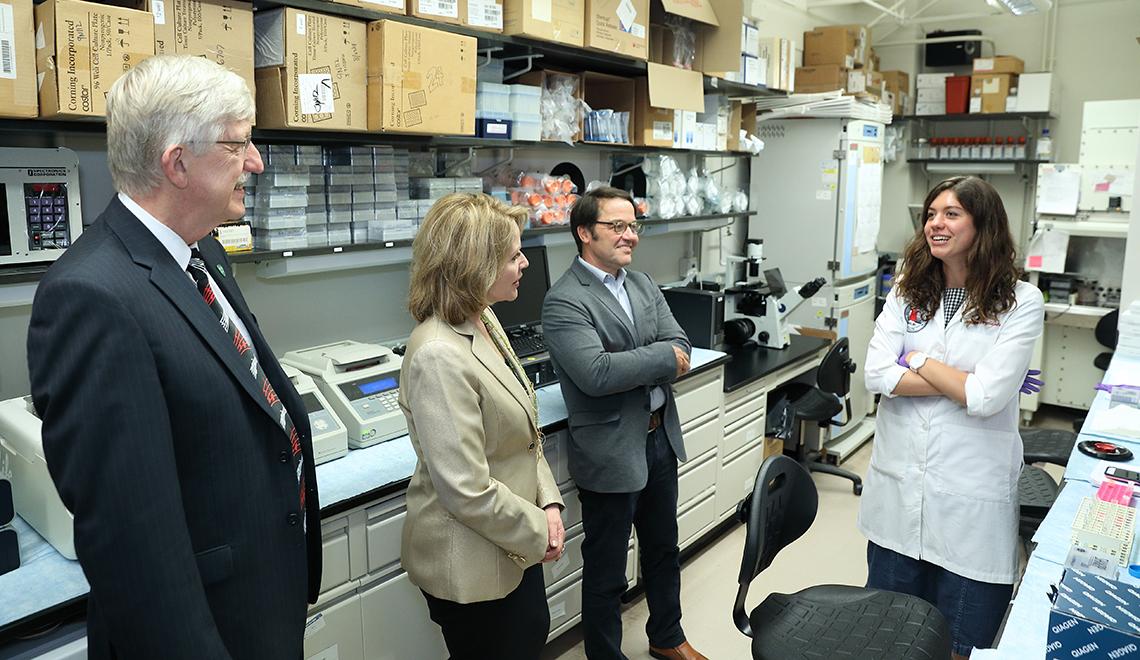 Collins and Fleming visit Tisdale and Drysdale in a lab