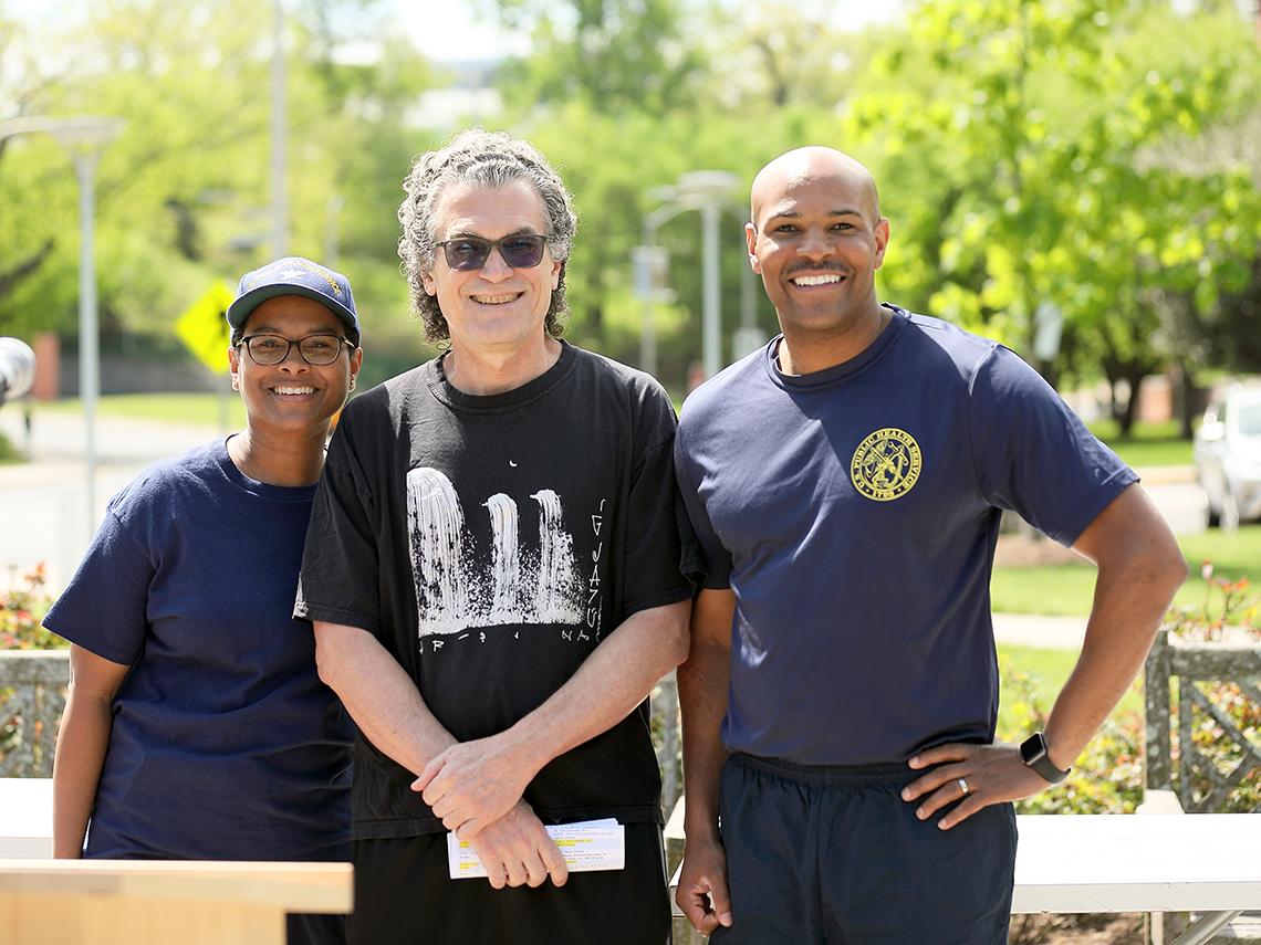 Collins, Adams and Pérez-Stable smile into camera