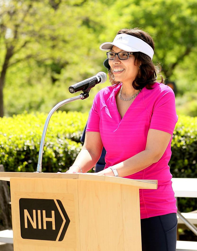 Carrington smiles at podium