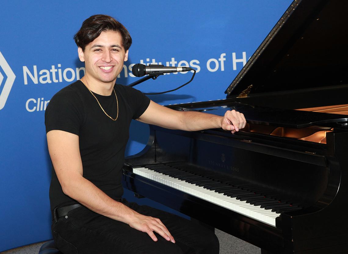 Urquiaga played music on a piano
