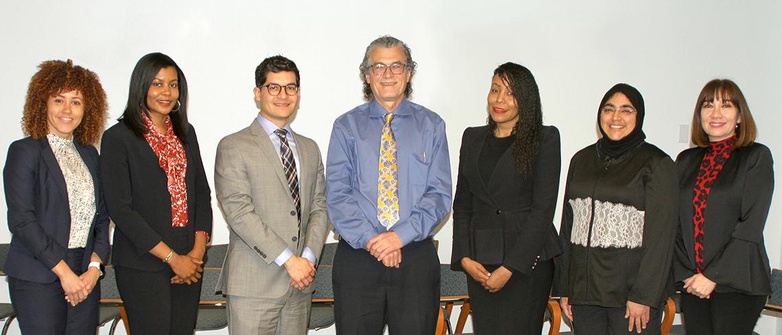 NIMHD director poses with group of fellows