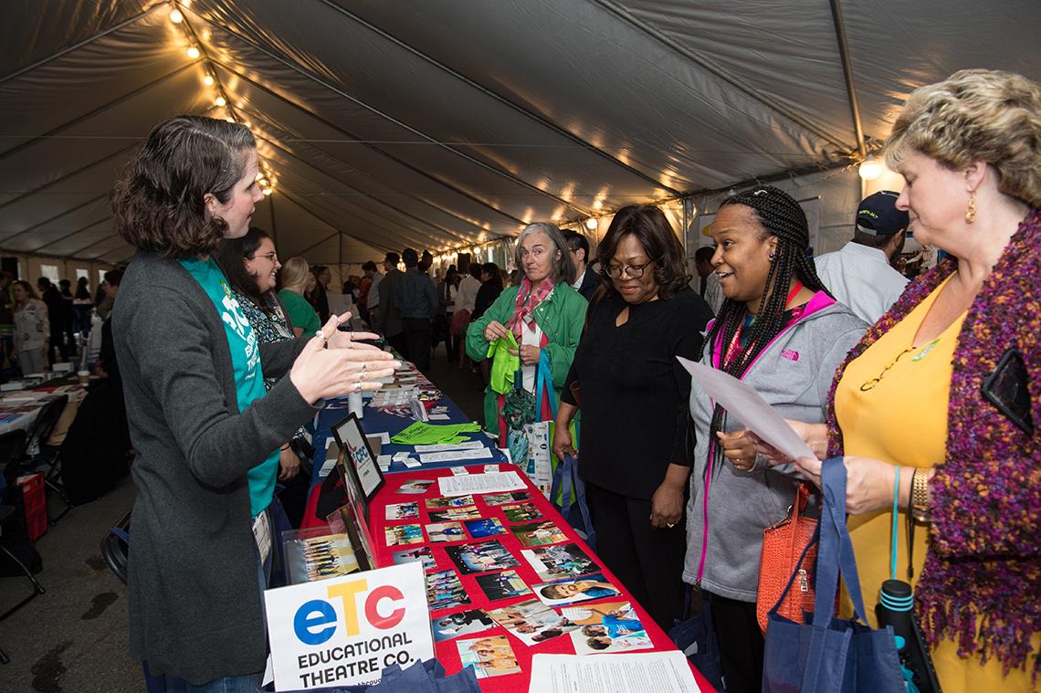 NIH employees browse charities eligible for the CFC.