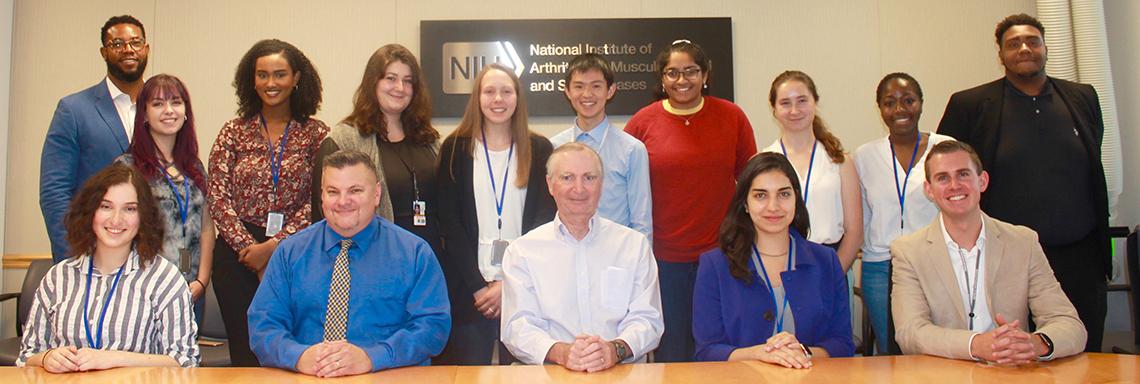 Summer students gather with NIAMS leadership.