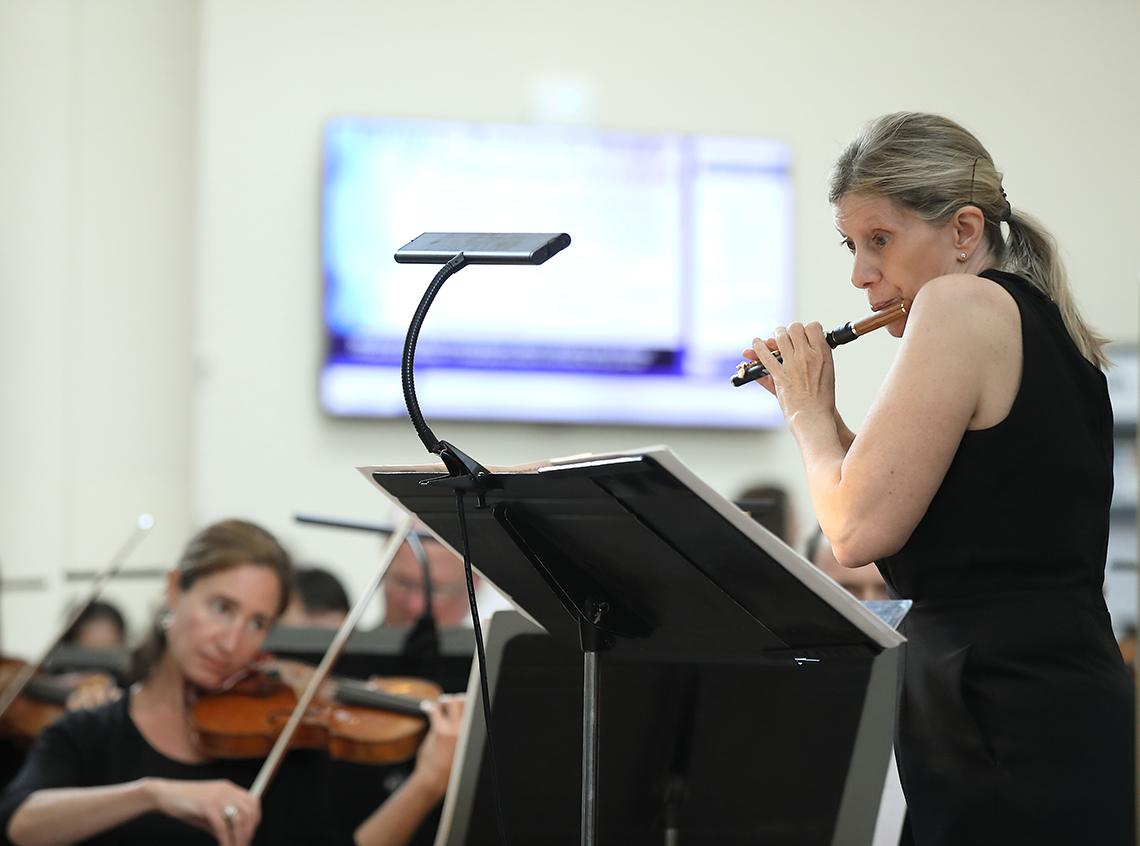 Carole Bean plays the piccolo
