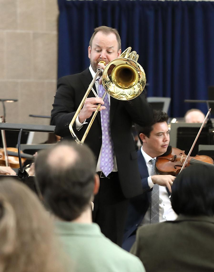 Matthew Guilford plays the bass trombone
