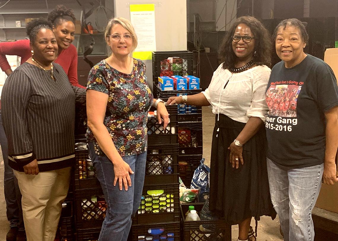 A group of canned food sorters.